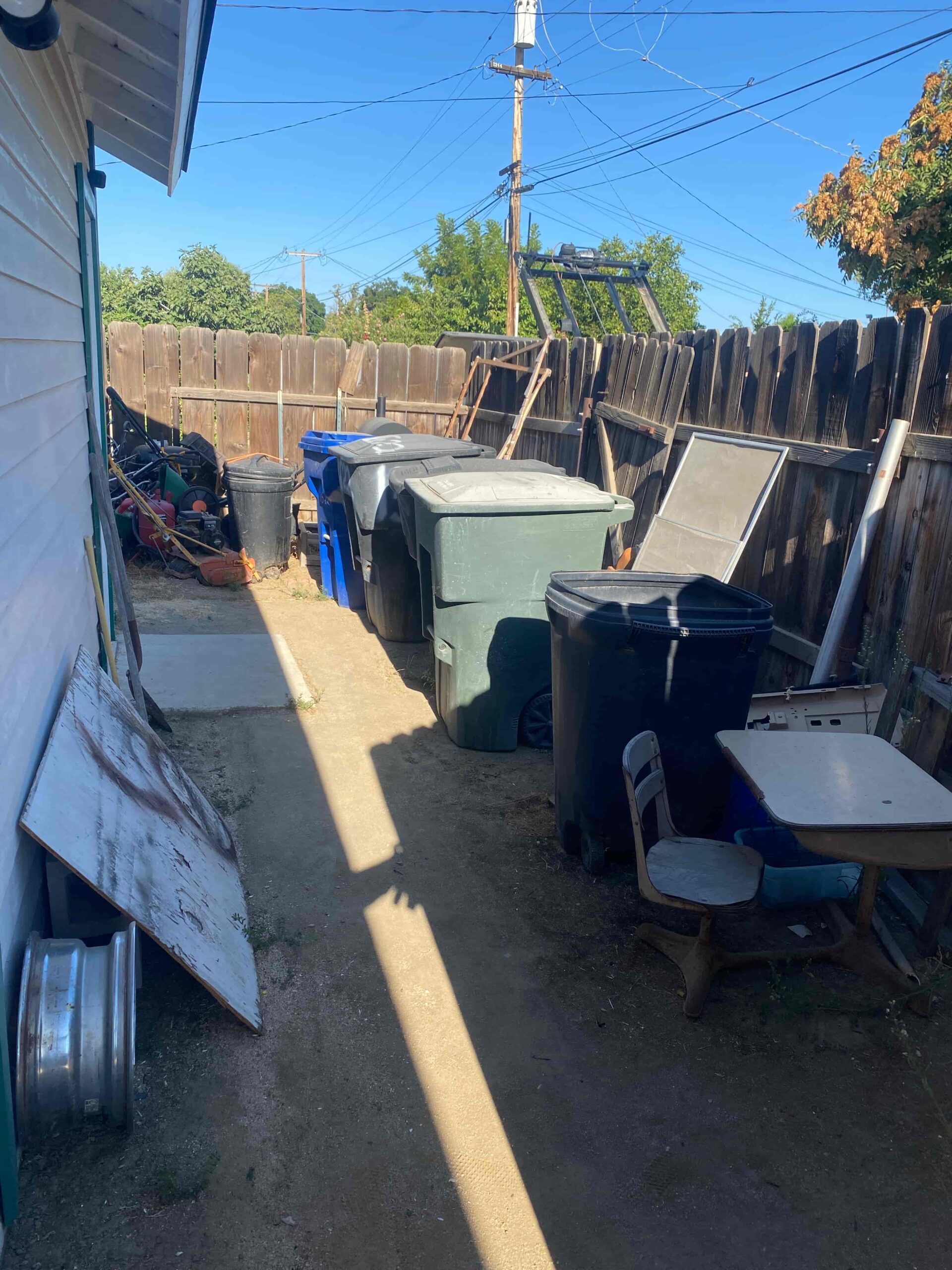 ready to roll dumpster hot tub waste before and after